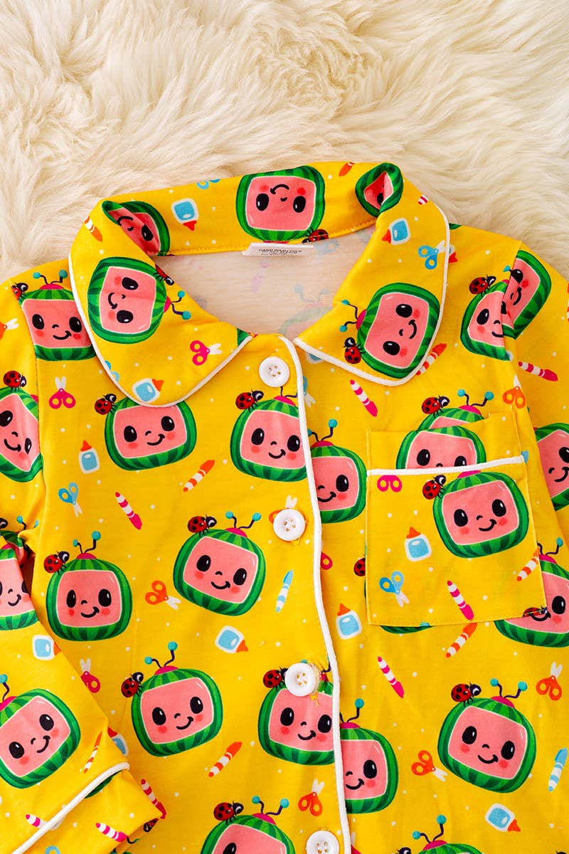 YELLOW CHARACTER PRINTED PAJAMA SET.