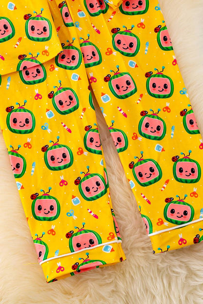 YELLOW CHARACTER PRINTED PAJAMA SET.